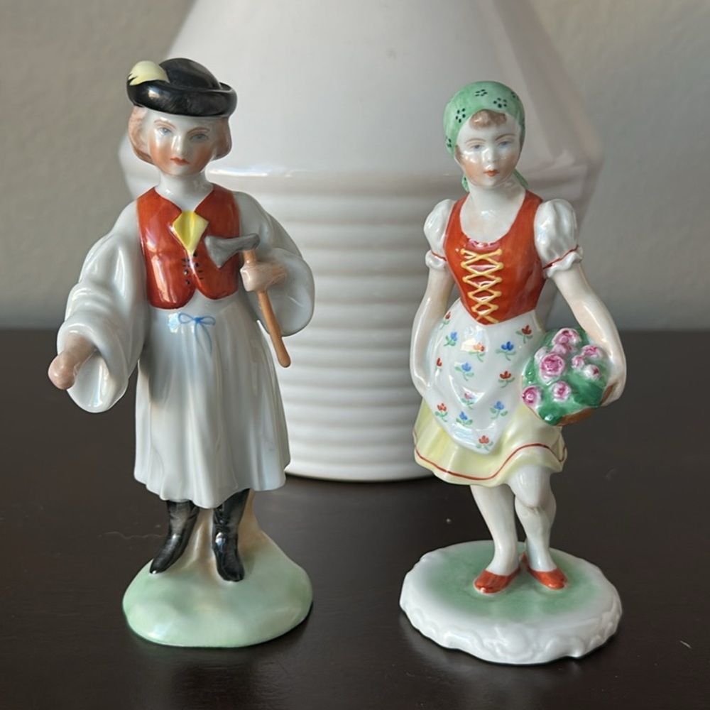 Herend Porcelain figurines. Flower basket and Hungarian boy with axe